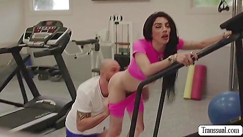 Big black ass brunette babe in a black turtleneck and stockings