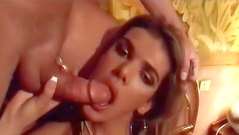 Busty brunette is getting fucked by a guy in a threesome