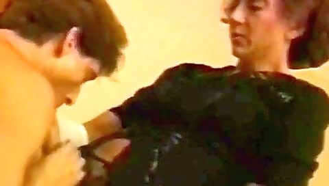 Mature brunette with a sexy ass fucked by a big dildo