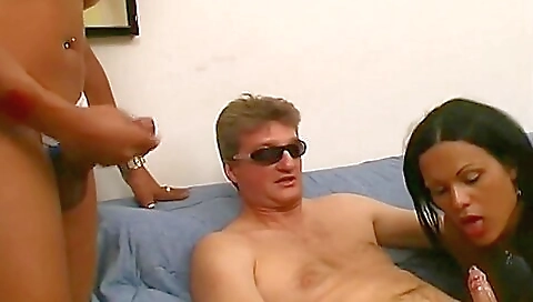 A brunette gets her pussy fucked in a retro threeway