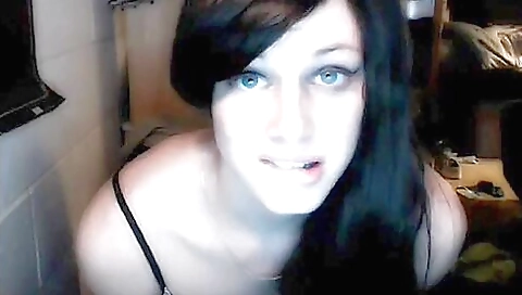 Amateur brunette in stockings and tights is in front of the camera