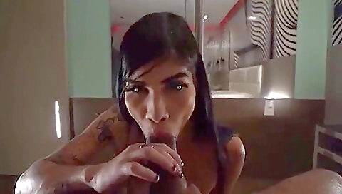 Tattooed babe and her lover are fucking on the couch