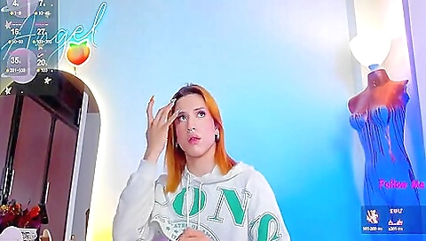 Beautiful tattooed redhead seduces herself with sex