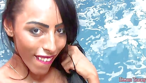 Brunette with big tits shows off her body and body